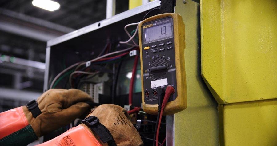 Multimeter reading voltage on wires inside a panel